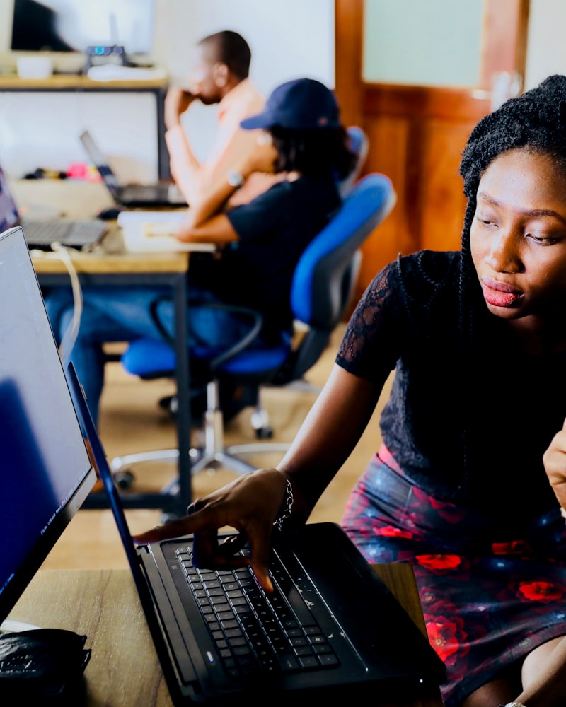 Small team discussion representing an SME security or IT group